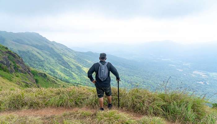 Trekking while exploring Palaruvi Falls is best to capture some scenic views of nature.