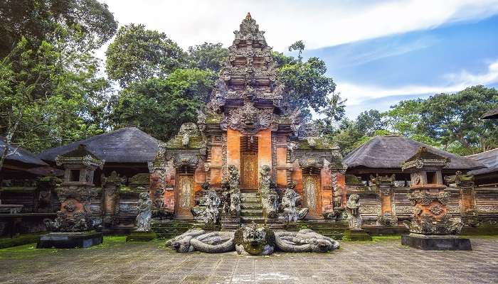 Seek blessing at the temple situated in the Ubud Monkey Forest