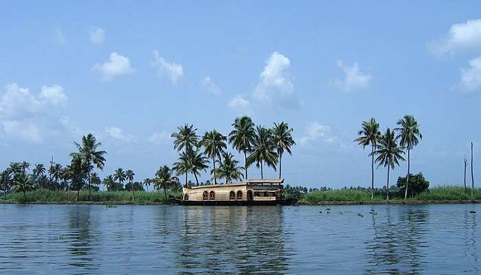 A soothing view of boat sailing on Vembanad Lake