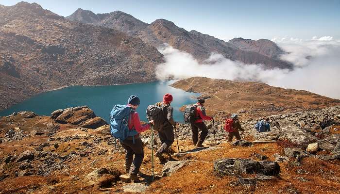 Trekkers descending the High-altitude Himalayas 