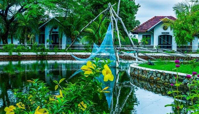 36 Palm Resort Cherai offer traditional villas with garden or sea facing.