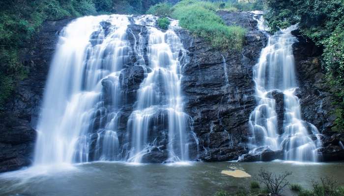 Enjoy the amazing waterfall view of Abbey Falls near Omkareshwar Temple Coorg