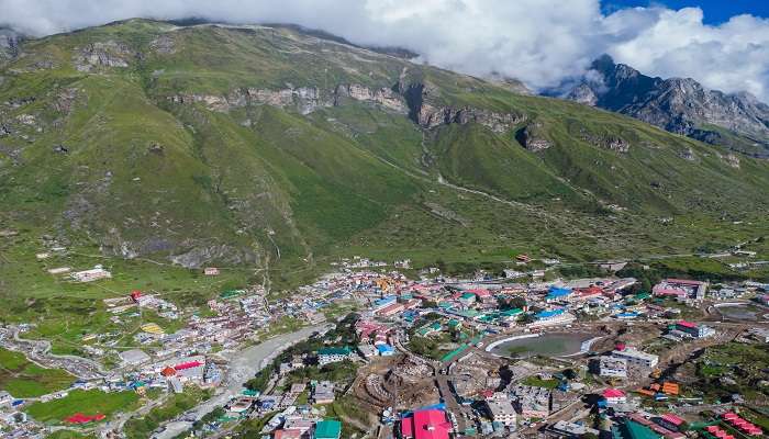 A scenic view of hills depicting things to do in Badrinath