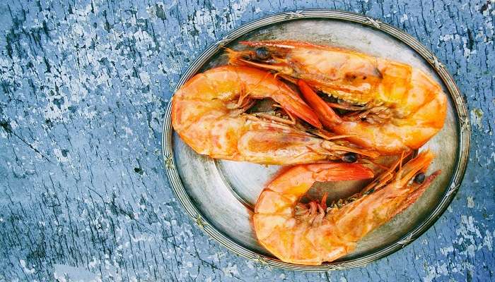Enjoy shrimp at the Anansa Boutique Hotel, one of the best restaurants in Kannur