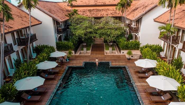 Enjoy the poolside at Anantara Angkor Resorts