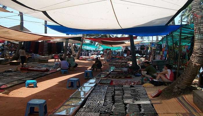 Shop local goods at the Anjuna Flea Market is the best places to visit in Goa with friends