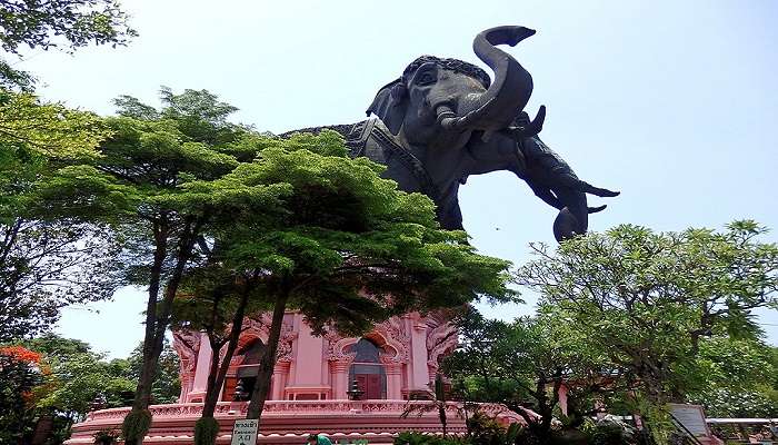 A unique museum located within the belly of a massive bronze statue of a three-headed elephant.