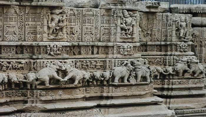 The gathering of devotees to worship at a temple in Dwarka