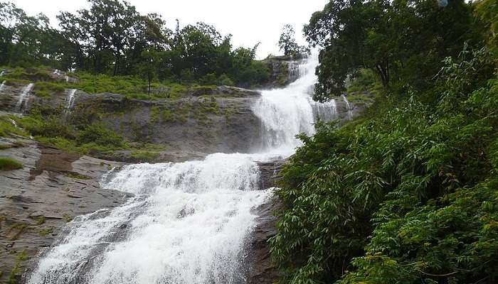 a mesmerizing view of the Kothamangalam waterfalls.