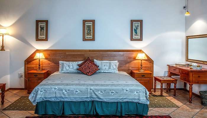 Spacious beds at the Capital O Ragas Inn, one of the best staycation near Nagarjuna Sagar Dam