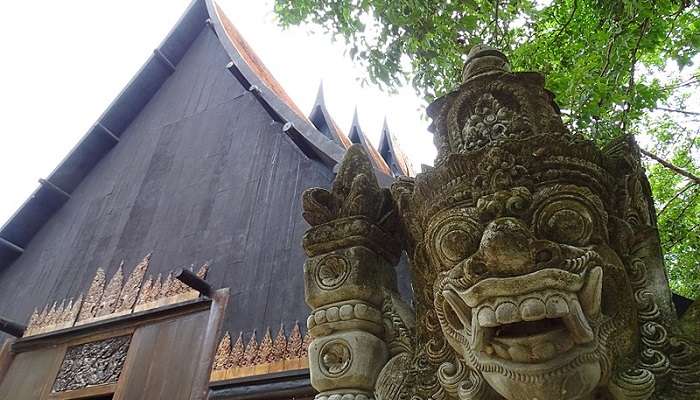 Ancient sculpture at Baan Dam Museum in Thailand.
