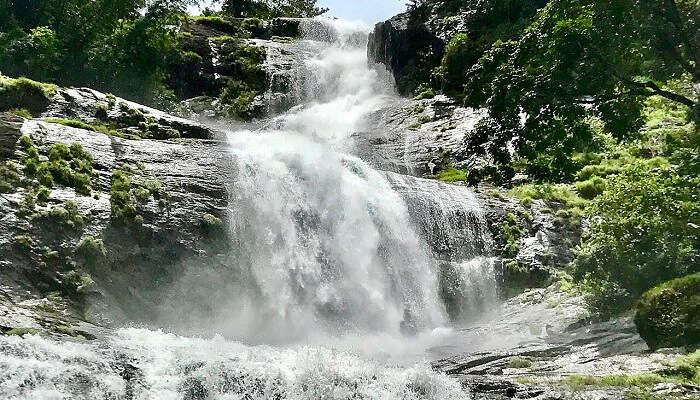 Panoramic view of Cheeyappara Waterfalls, one main attraction near Tea Castle Resort Munnar.