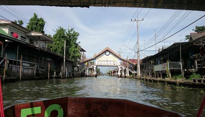 You must shop for the local produce at Damnoen Saduak Floating Market.
