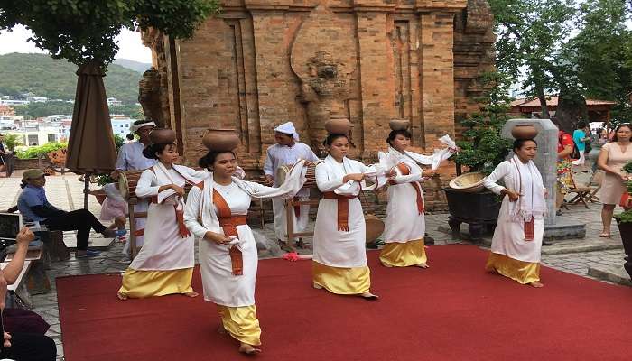 Dancers wearing traditional dresses during festival 