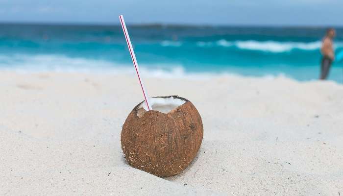 Relax and enjoy refreshing coconut drink at Dua on the An Thoi islands in Vietnam