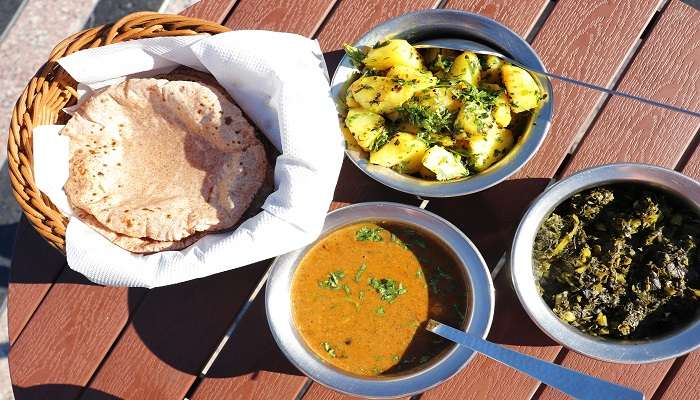 A picture of Dubuk and other dishes served in Dhanachuli