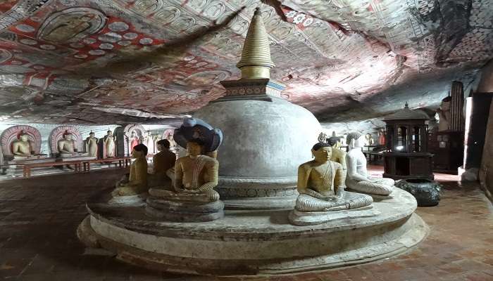 Ancient Buddhist Statues inside Dambulla Cave Temple in Sigiriya in Sri Lanka