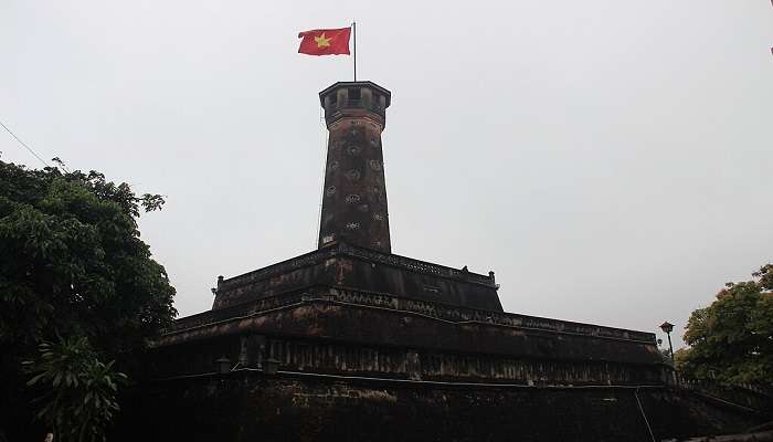 Hanoi flag tower with the national flag of Vietnam at the the Imperial Citadel of Thang Long