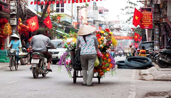 Vietnamese vendor on the streets of Hanoi
