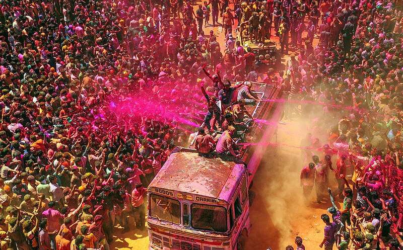 People playing with colors on Holi