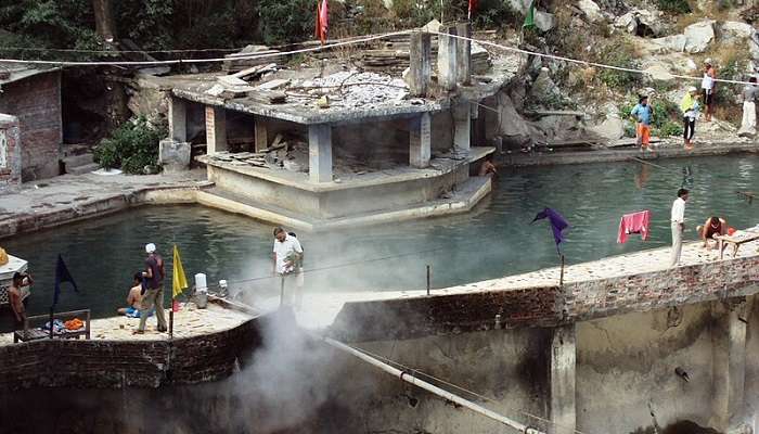 People at the Hot Spring lake in Himachal