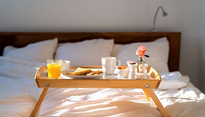 Breakfast on a hotel bed of blue Moon