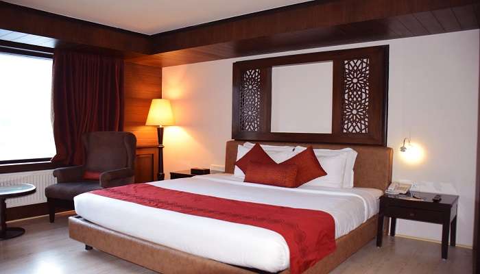 You can find a king-size bed in every room of Hotel Tarangini Inn