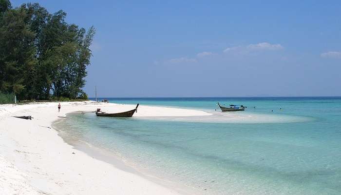 Take a walk on the white sandy beach in Thailand