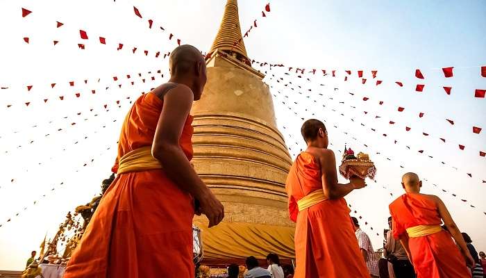 Monks at Wat Saket performing rituals