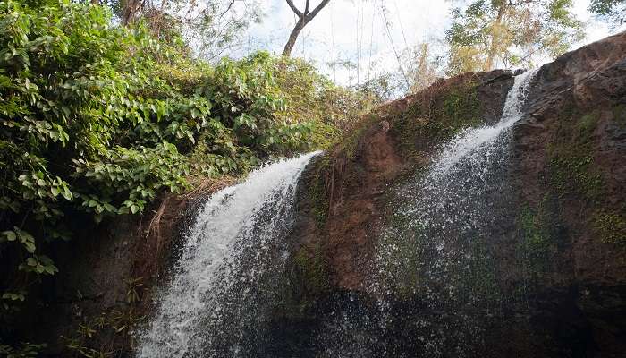 Explore the beautiful Ka Tieng Waterfall near Kachanh Waterfall