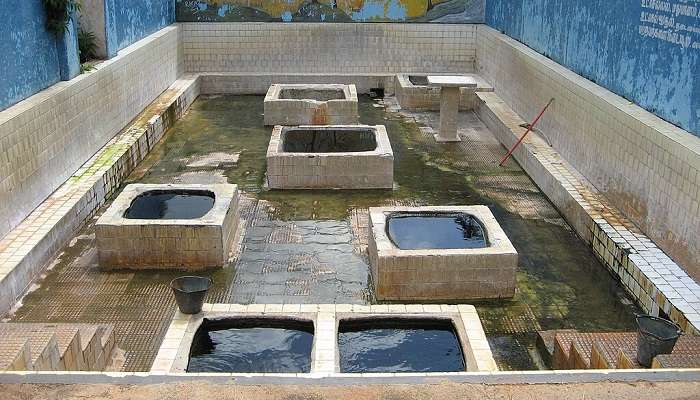 Rectangular shaped wells holding water at Kanniya Hot springs