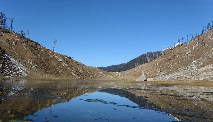 The crystal clear water at Kareri Lake