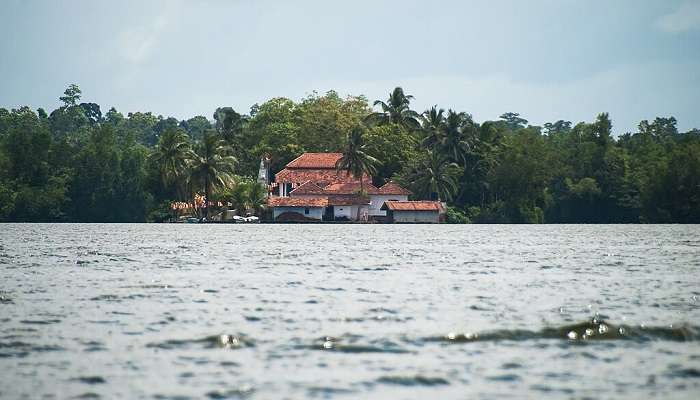 Scenic view of Kathaluwa temple in the middle of the river.