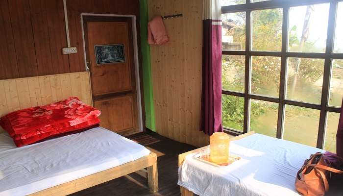 A Charming room of the Kavyashree homestay and diverse amenities.