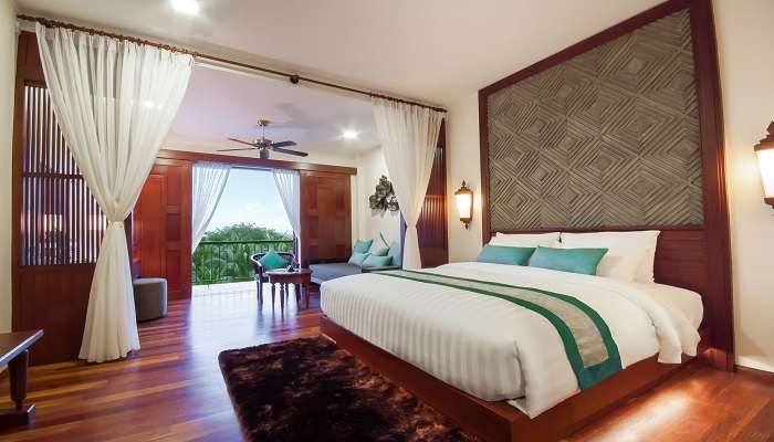  The cosy bedroom of the Lotus Blanc Resort