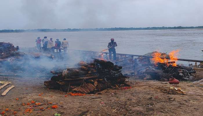 Cremation and eternal flames in Manikarnika Ghat near Harishchandra Ghat
