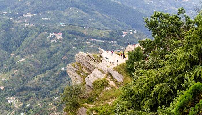 Panoramic View of Mukteshwar Valley covered with lush greenery.