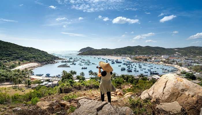  Panoramic view of Nui Chua National Park's diverse landscape with mountains and coastal areas at Phan Rang in Vietnam