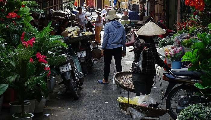 Exploring the narrow alleys of the Old Quarter is one of the best things to do in Hanoi in June.