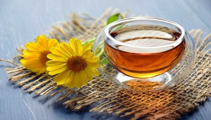 An image of a mouth-watering tea in a clear glass cup