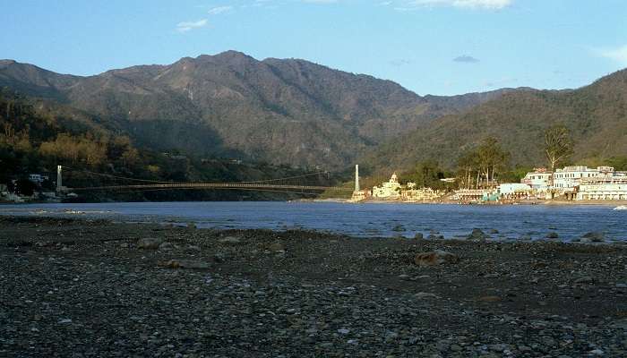 The Holy Ganga river flows through Rishikesh, one of the best places to visit in Uttarakhand with family. 