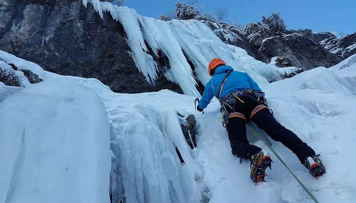 Rock climbing is one of the best outdoor activities to do while experiencing snowfall in Kanatal