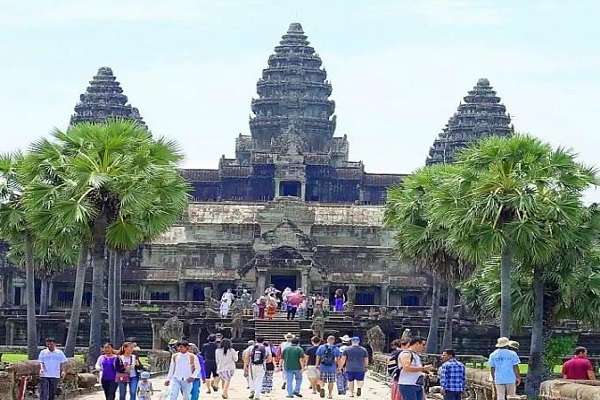 Tourists visiting Angkor Wat Vishnu Temple 