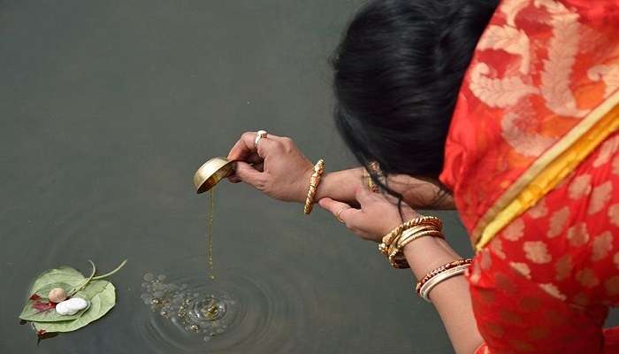 Offering flowers and diyas are some sacred items to the Ganges is a common ritual at the ghat.