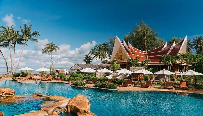 A poolside bar awaits guests to have fun at a Koh Chang resort