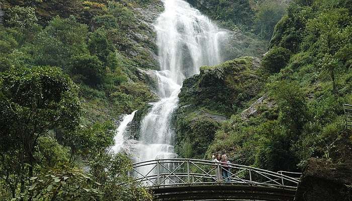 White stream of water gushing down at Silver Waterfall, a popular attraction near Hoang Lien National Park.