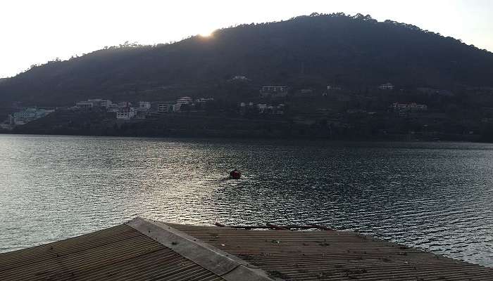 Immerse yourself in the scenic beauty of the Bhimtal lake after a heavy snowfall