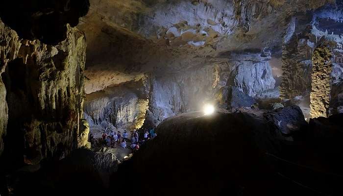 Visitors admire the beauty of the interiors of Sung Sot Cave.