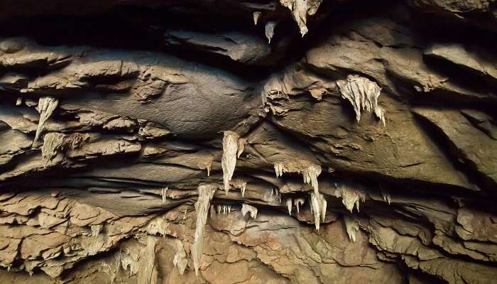 stalactites inside Tham Lawa Cave, a popular destination near Sai Yok Yai Waterfall