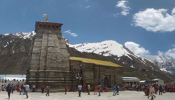 Kedarnath in December along with the snow-covered mountain range